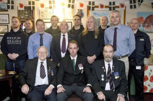 Local firefighters join ex-service personnel at the veterans' breakfast held in the Penzance branch of the Royal British Legion.Picture by Greg Martin